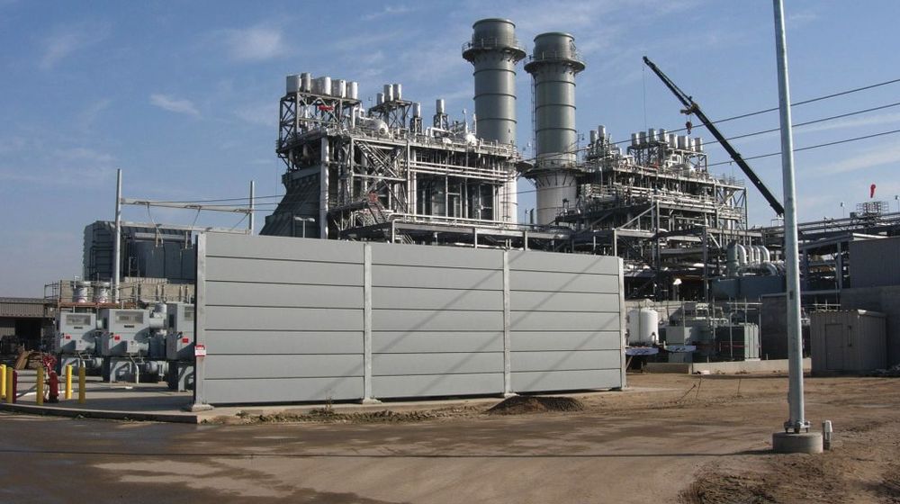 Power generation facility with coated stacks, piping, and equipment enclosures